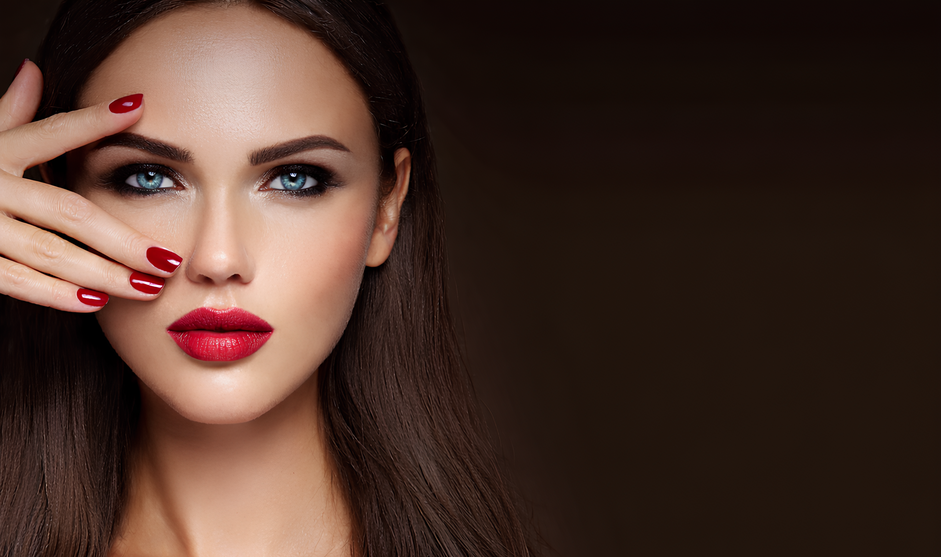 Model with red manicure